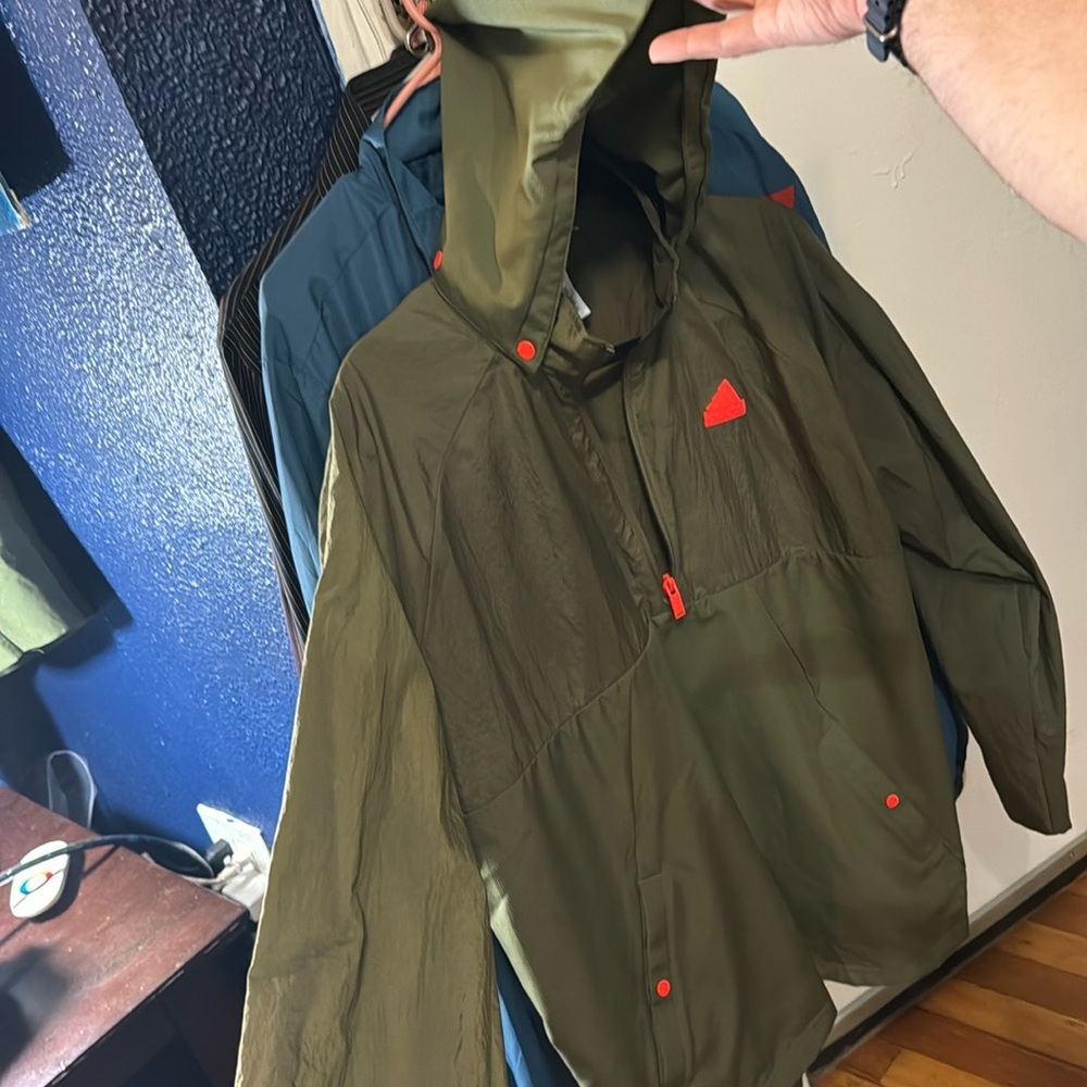 ADIDAS size medium water proof windbreaker with break-away hood